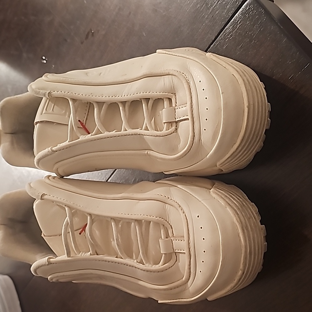 White Fila running shoes